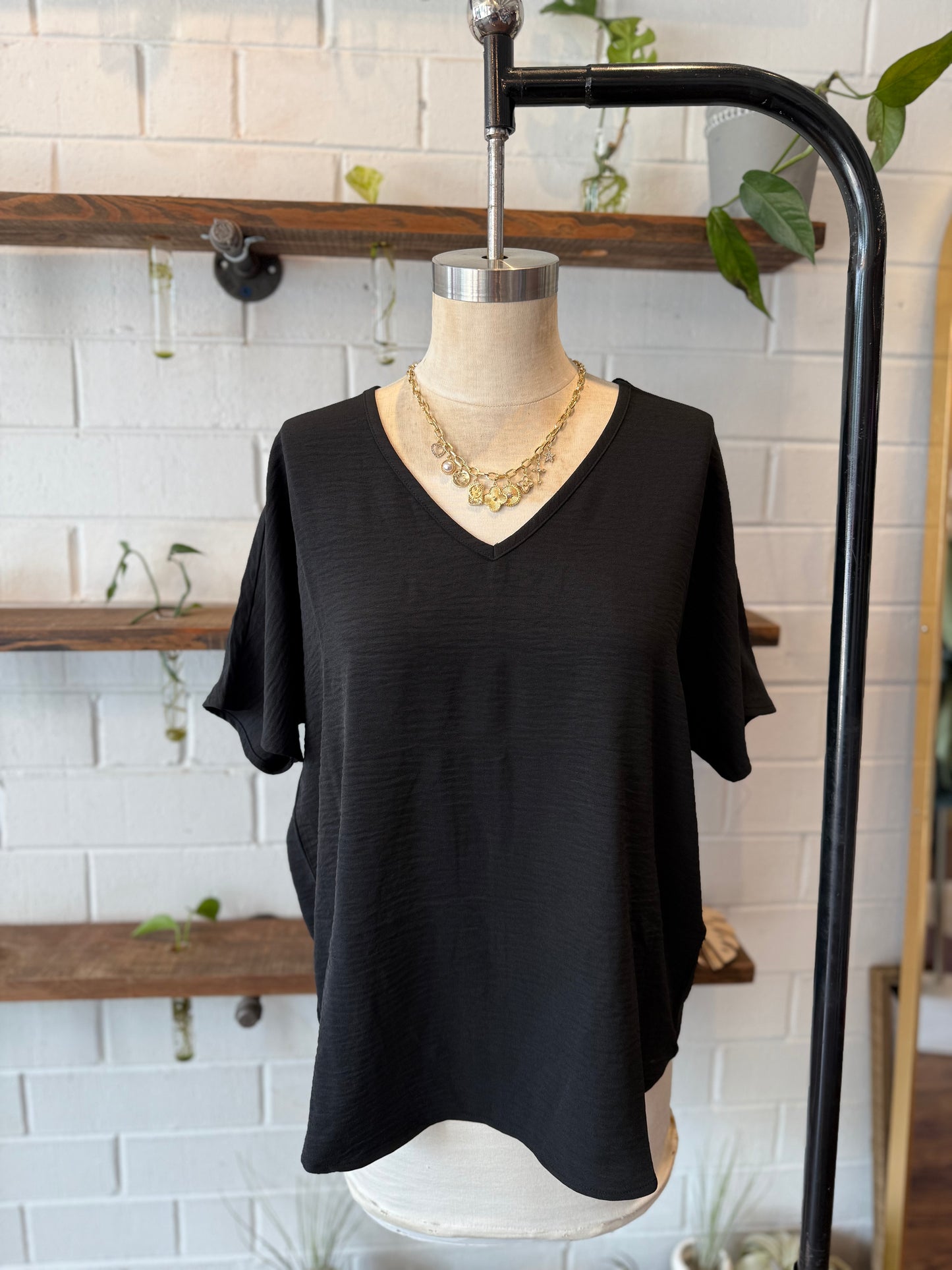 Black Woven Airflow V-Neck Long Hem Short Sleeve Top