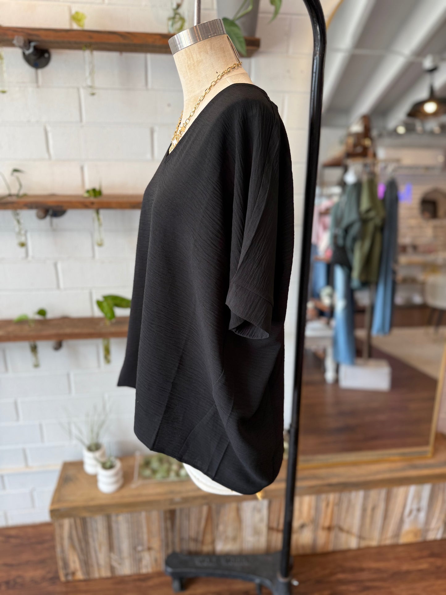Black Woven Airflow V-Neck Long Hem Short Sleeve Top
