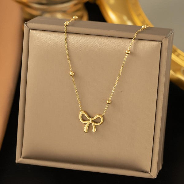 Stainless Steel Saturn Chain Link Necklace With Bow