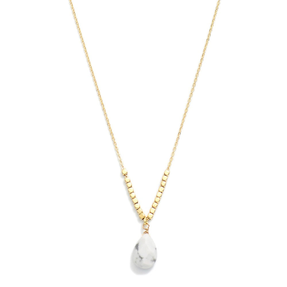 Gold dainty chain w/ white teardrop stone
