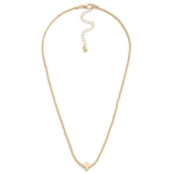 Metal Tone Beaded Necklace Featuring Criss Cross Station