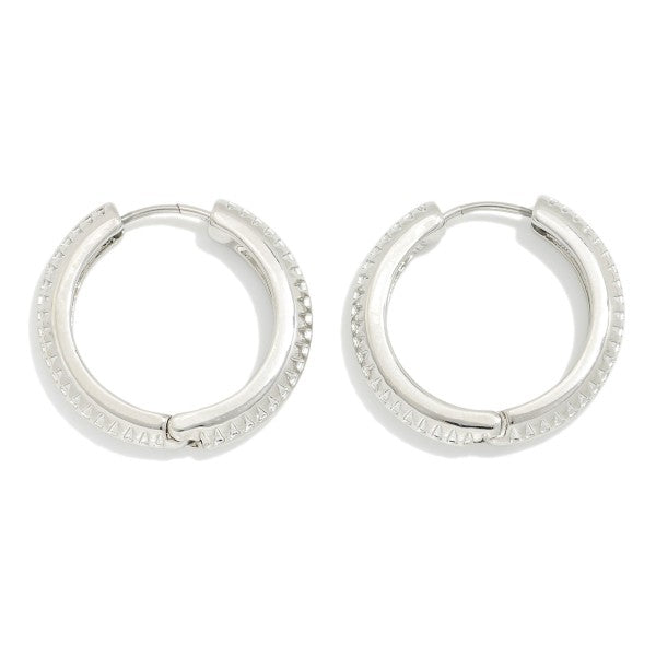 Metal Tone Hinged Hoop Earrings With Dimpled Spine
