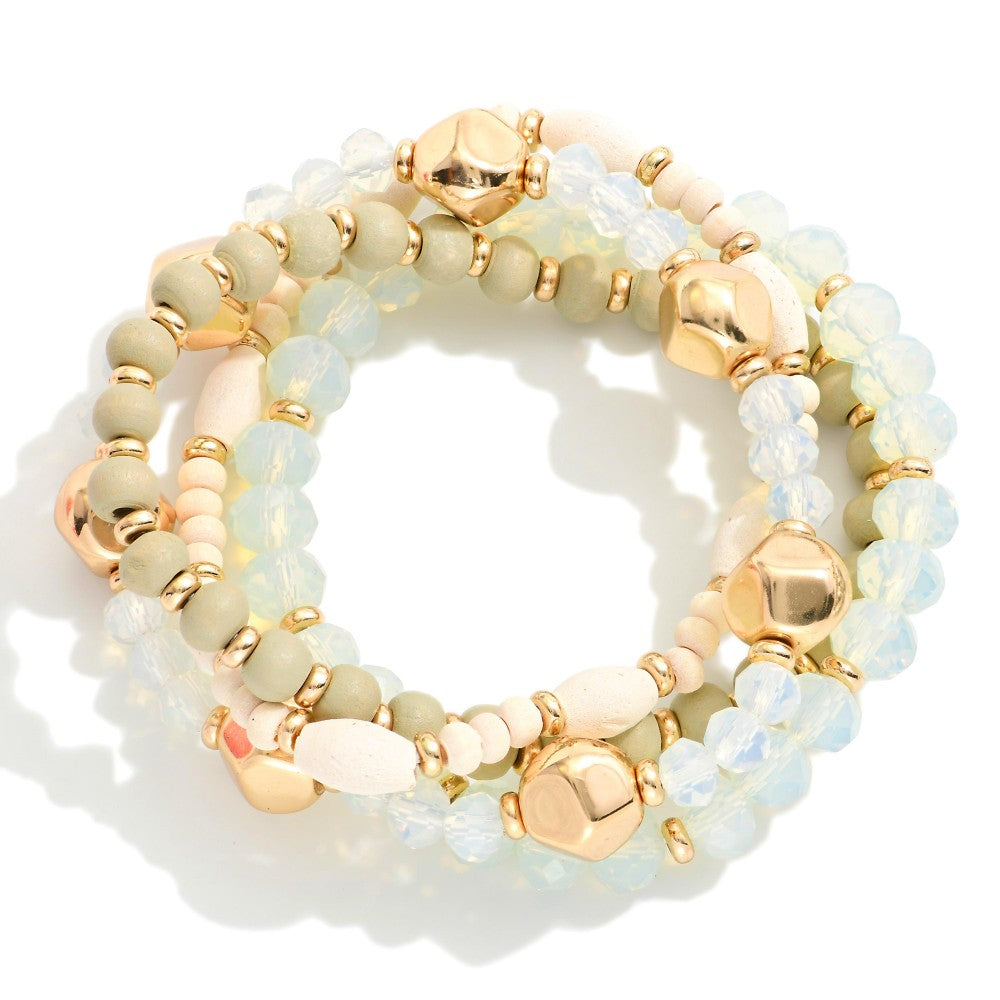 Set Of Four Beaded Stretch Bracelets Featuring Wood Beads, Faceted Beads & Gold Tones