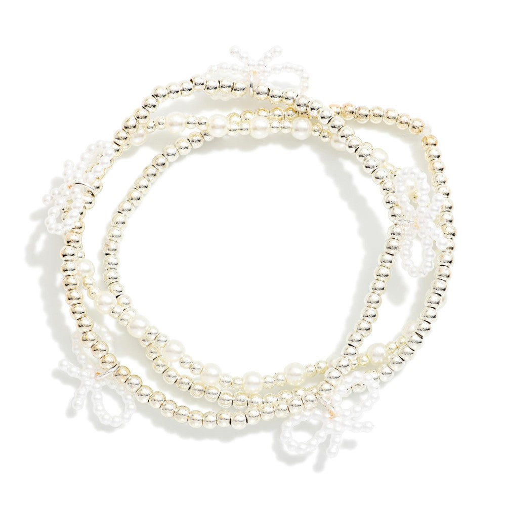 Set Of Three Metal Tone & Pearl Beaded Stretch Bracelets With Bow Details - Silver