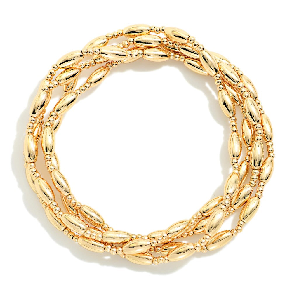 Set Of Four Metal Tone Cylinder Bead Beaded Stretch Bracelets