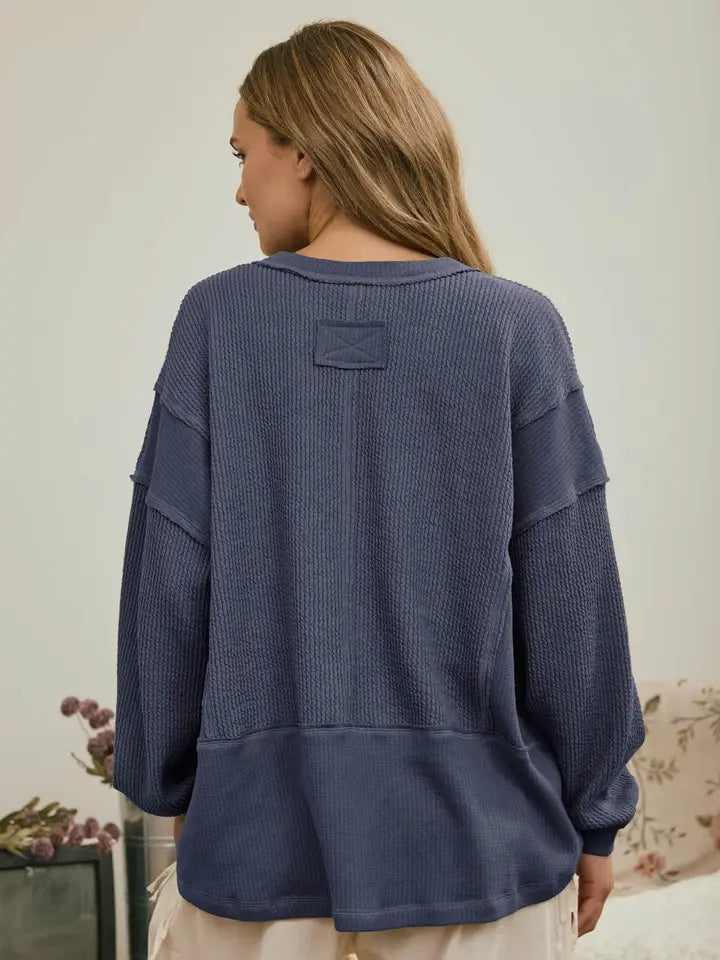 Split Neck Raw Edge Long Sleeve Ribbed Knit Top