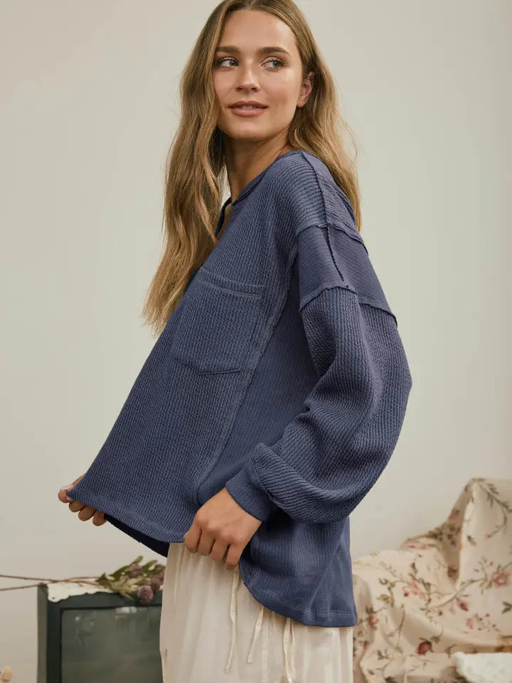 Split Neck Raw Edge Long Sleeve Ribbed Knit Top