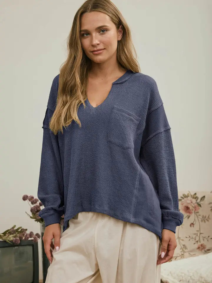 Split Neck Raw Edge Long Sleeve Ribbed Knit Top