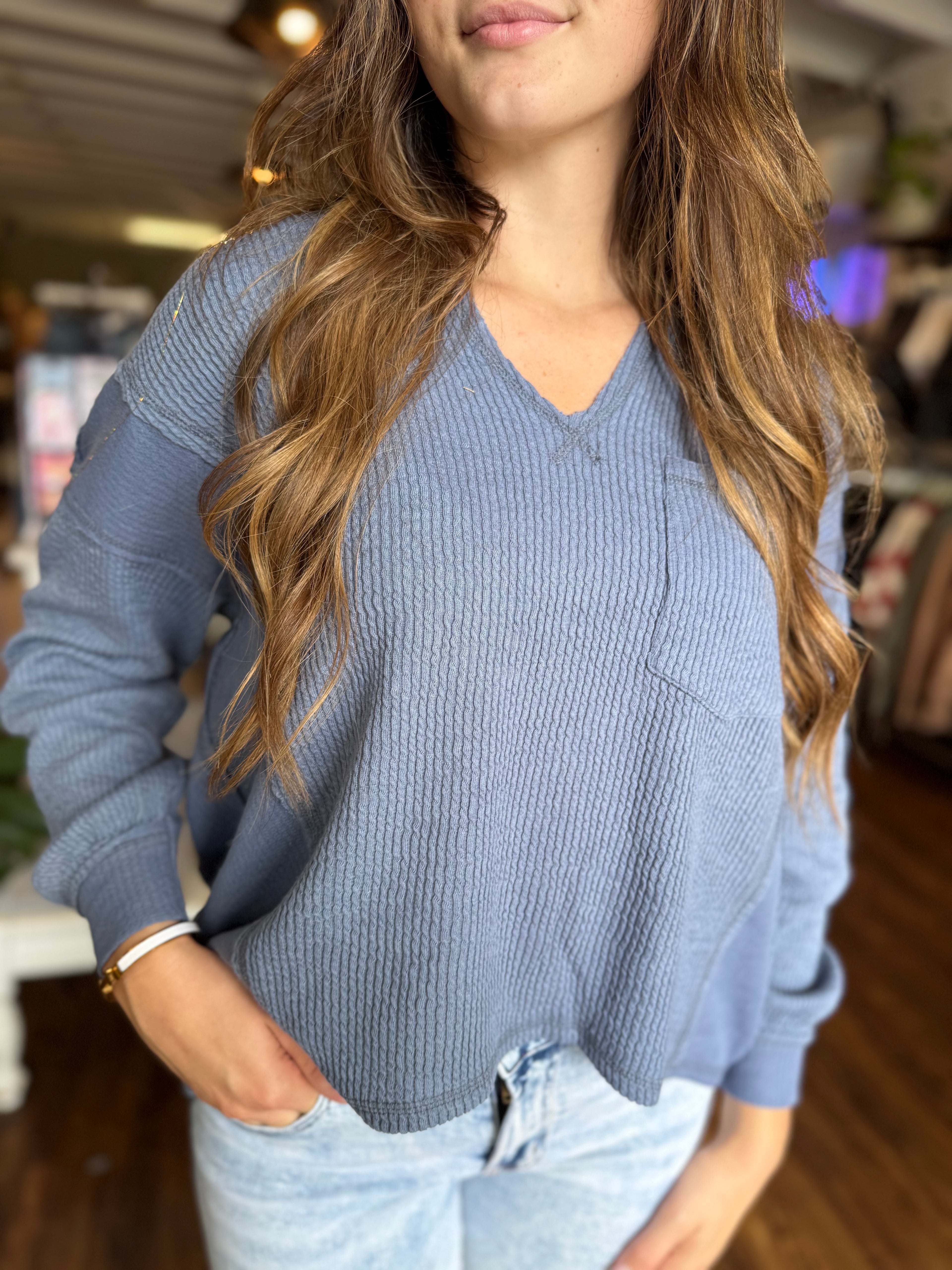 Split Neck Raw Edge Long Sleeve Ribbed Knit Top