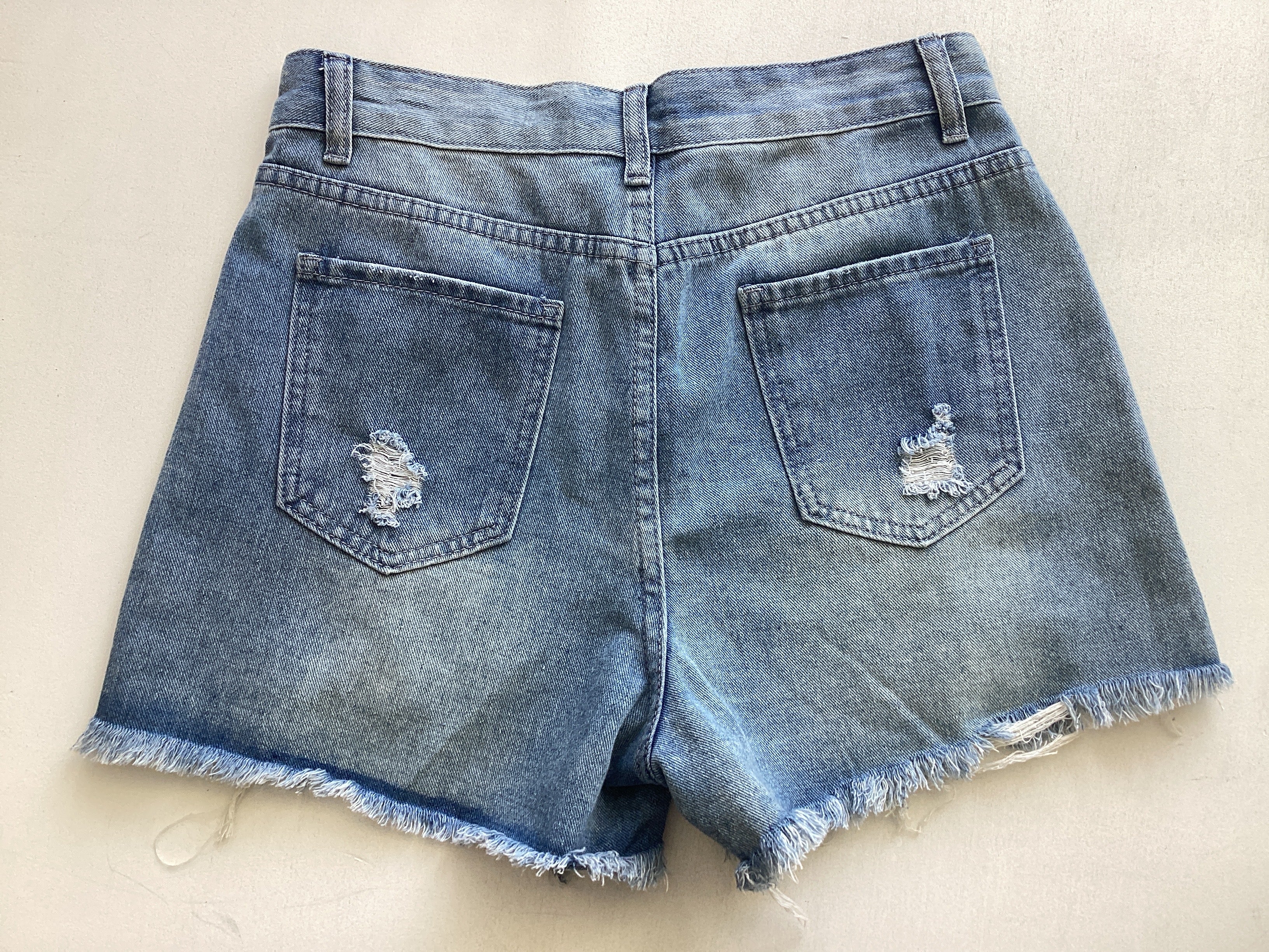 High-Waisted Denim Shorts with Frayed Edges