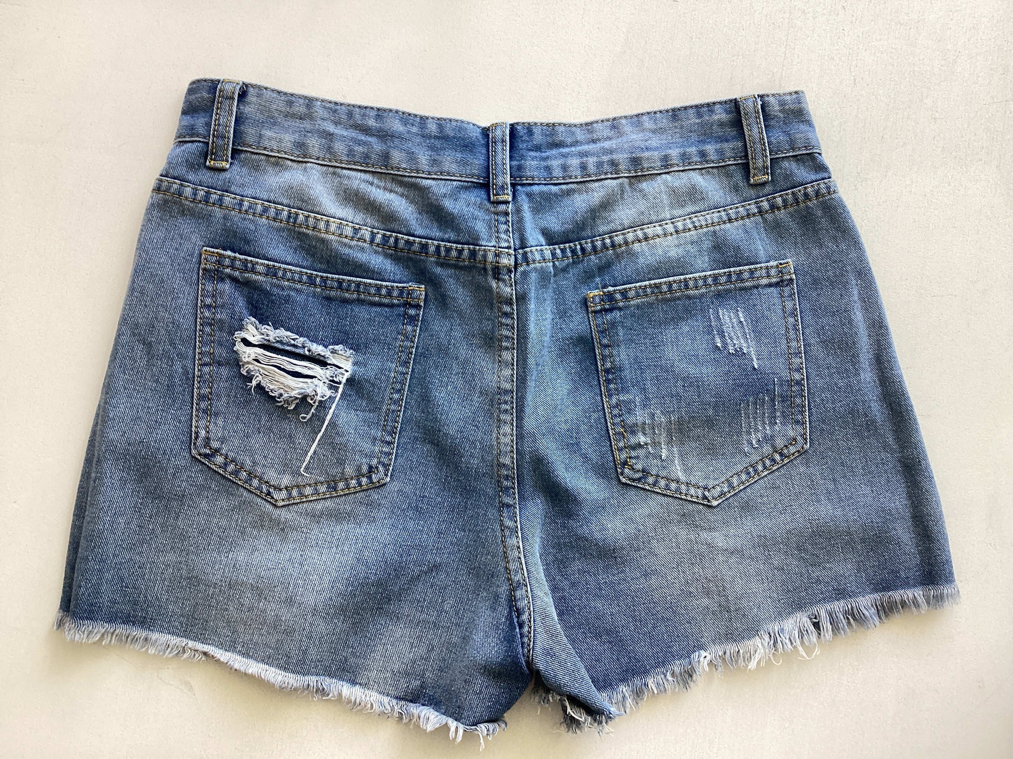 Versatile Ripped Fringe Denim Shorts